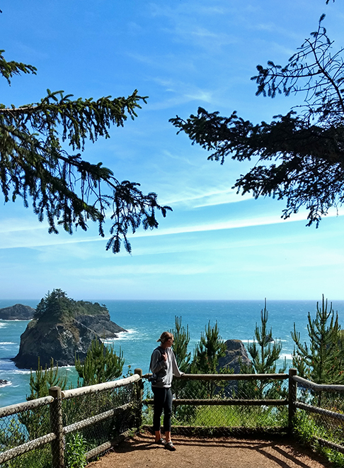 Ali looking at Arch Rock 