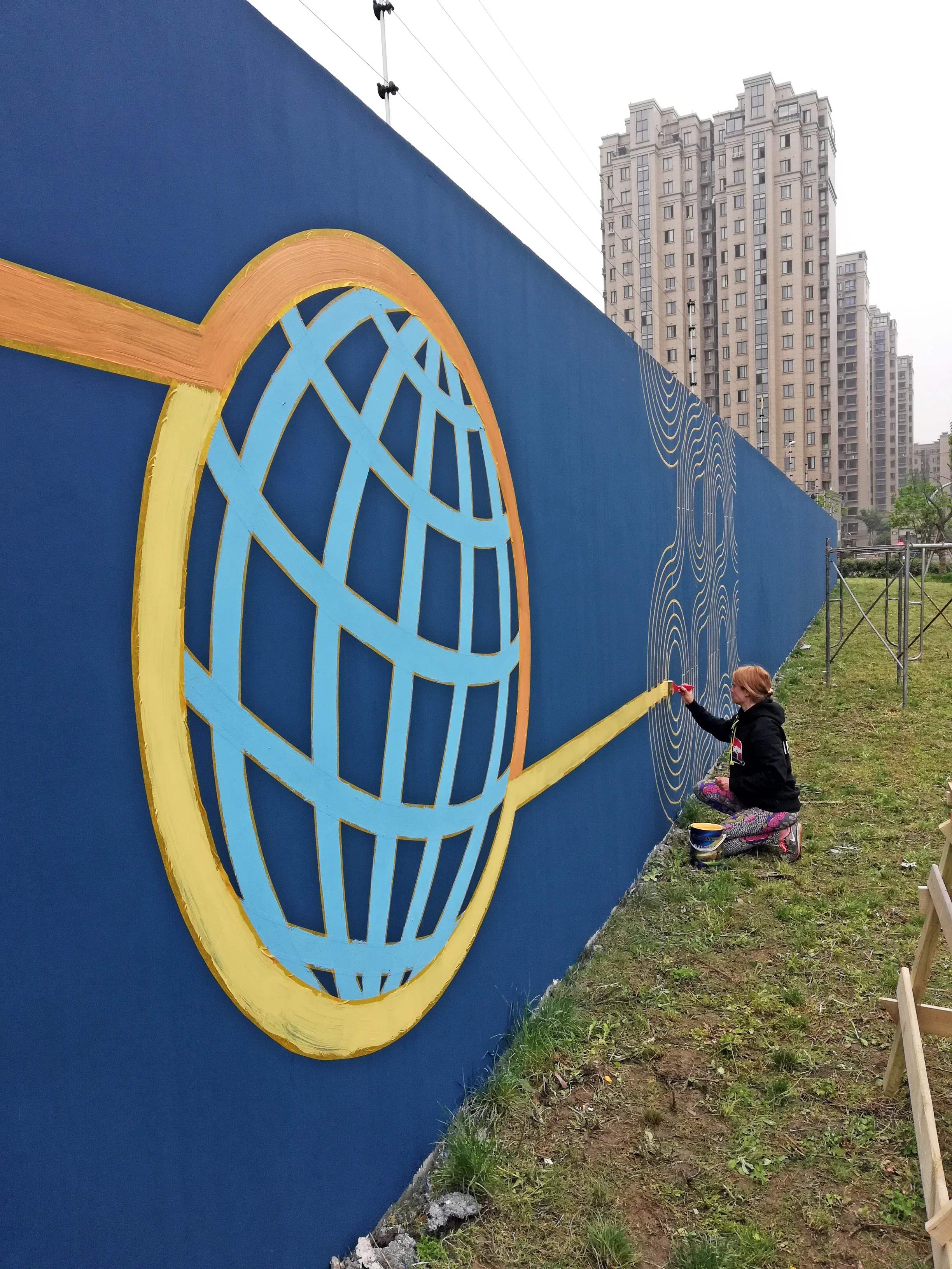 Ali painting the world