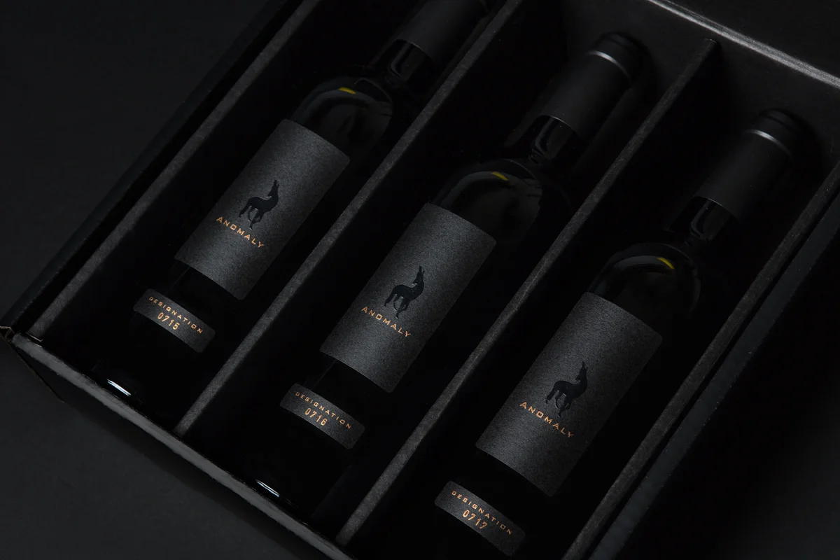 Three bottles of Designation in box