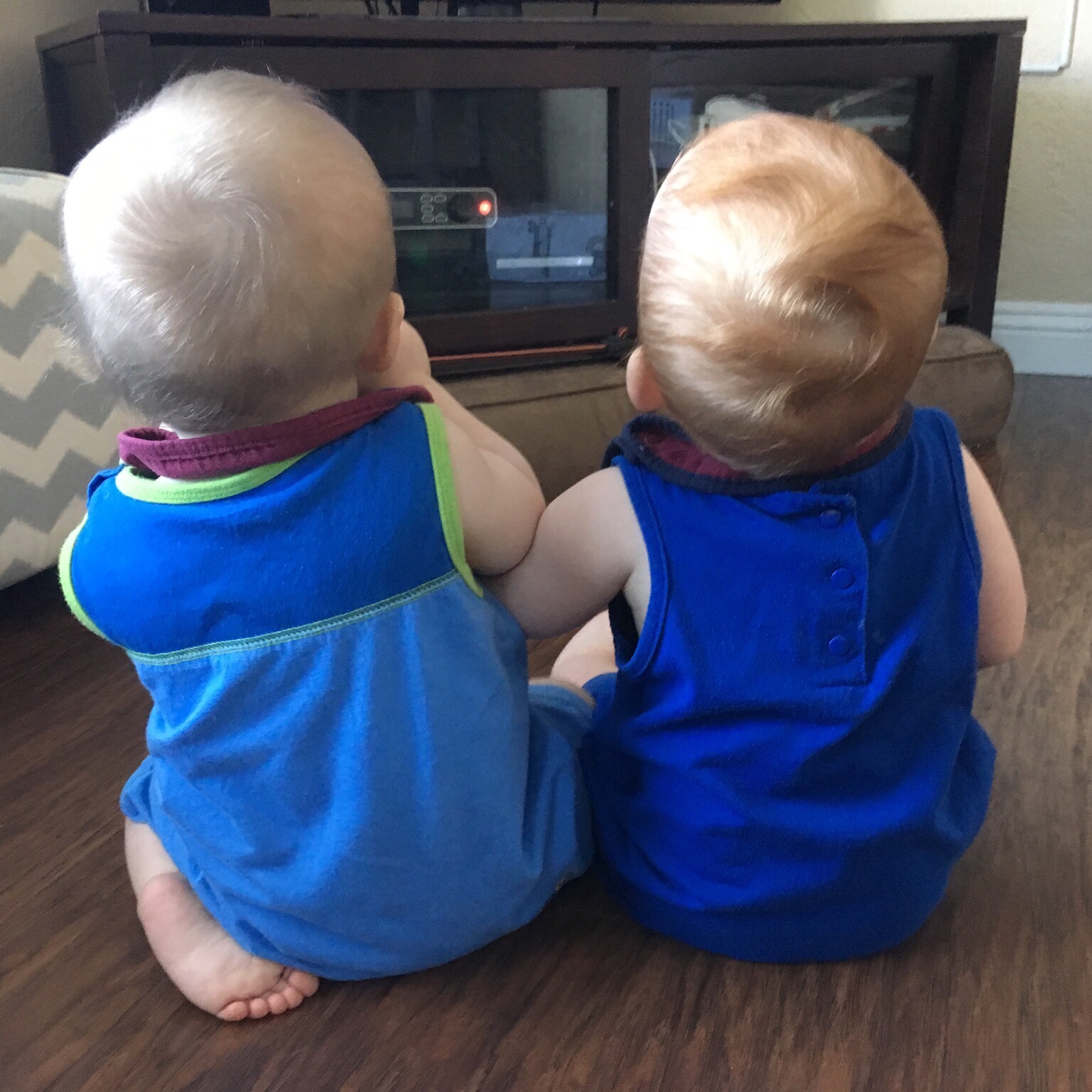 Julian and Joshua paying attention to music on TV