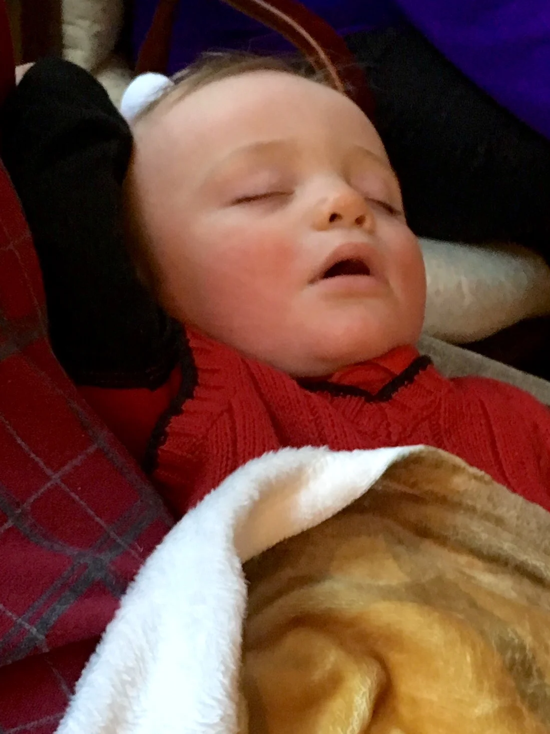 Julian sleeping soundly after playing hard on Christmas. 