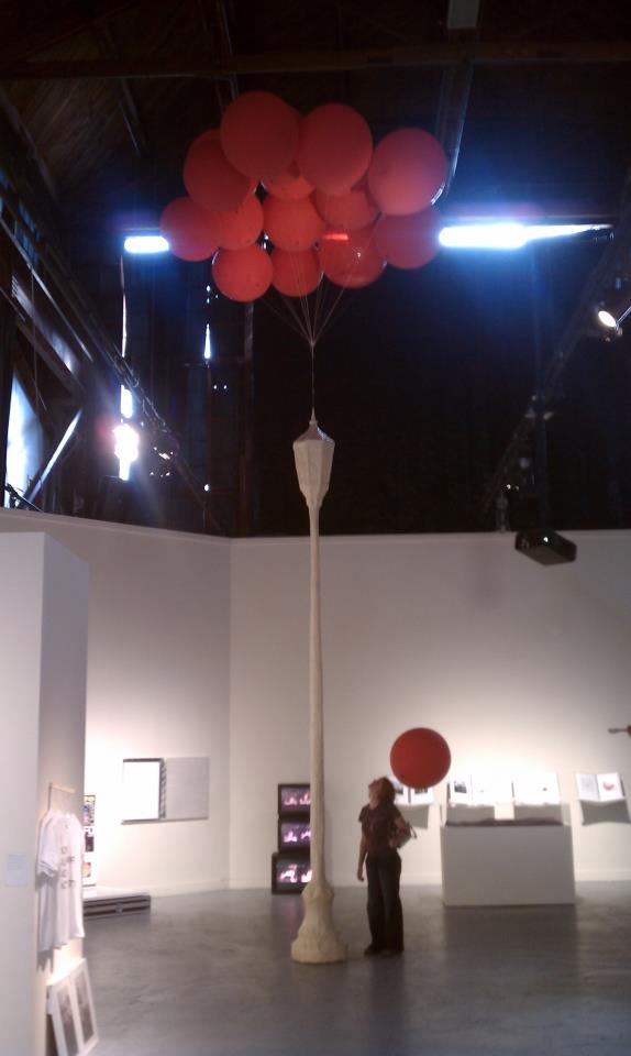   Floating Lamppost    Installation at  Frontrunners , SOMArts, San Francisco  Masking tape, twine, helium ballons  2011 