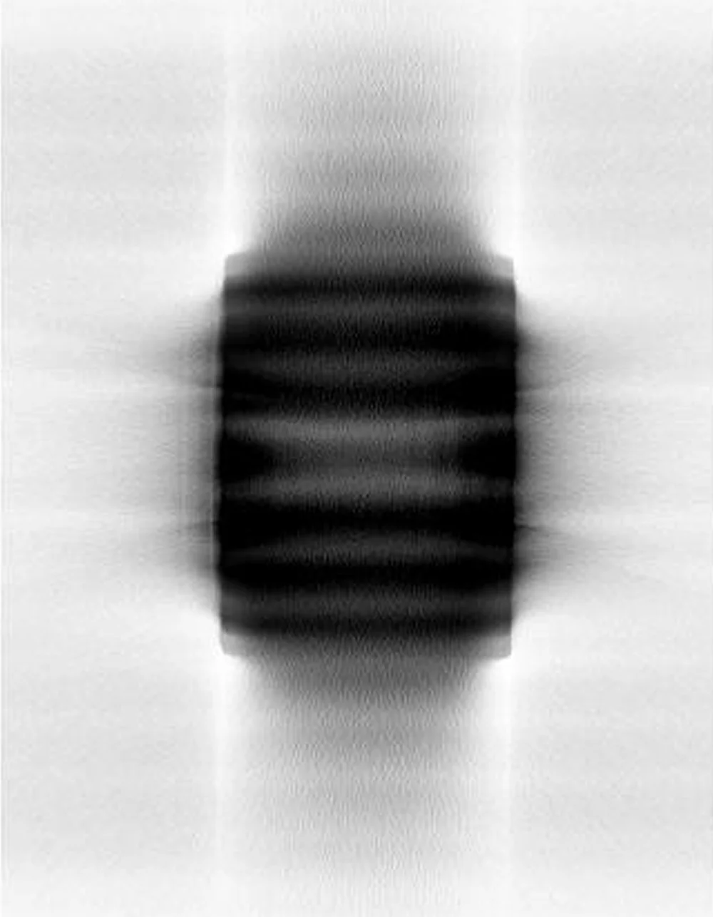 Lead Cylinder #1, Giclee on Somerset paper, 21x28 inches, 2012 This image was developed from a CT scan of a lead cylinder. The lead scatters x-rays, creating patterns and obscuring the shape. The single scan was randomly rotated and sections in thousands of variations.