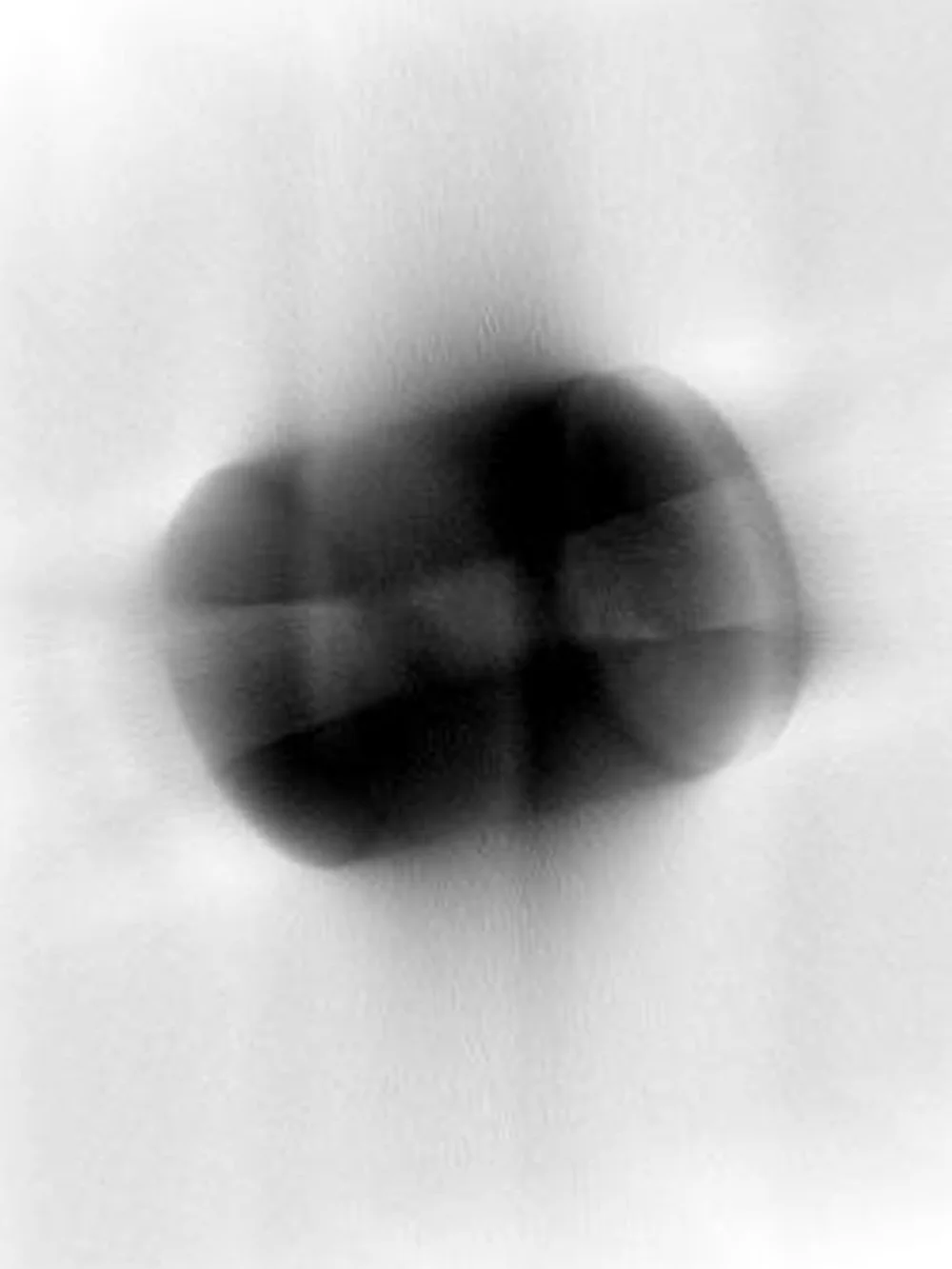Lead Cylinder #4, Giclee on Somerset paper, 21x28 inches, 2012 This image was developed from a CT scan of a lead cylinder. The lead scatters x-rays, creating patterns and obscuring the shape. The single scan was randomly rotated and sections in thousands of variations. 