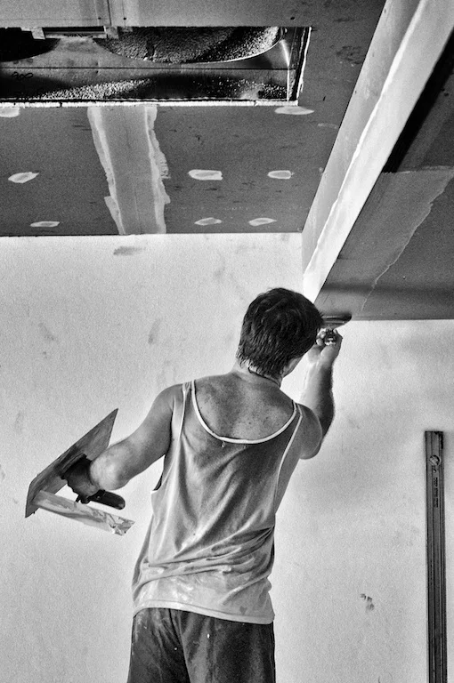 Nige plastering the bulkheads