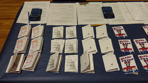 Some of the high school mini comics! These comics are one sheet of paper, folded like origami, to make 8 pages.
