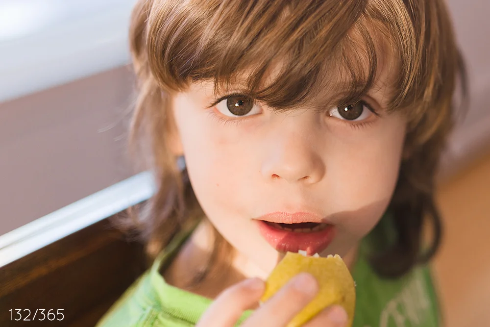 Facing the sun, while nibbling on your pear at dinnertime.