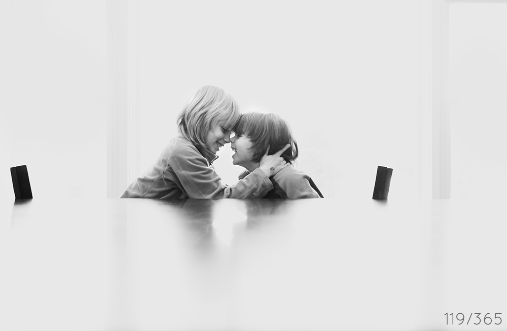 I asked you to rub noses right before leaving for the bus stop. I took this image, and was positively giddy when I saw it on my computer. You too smiling and happy together.