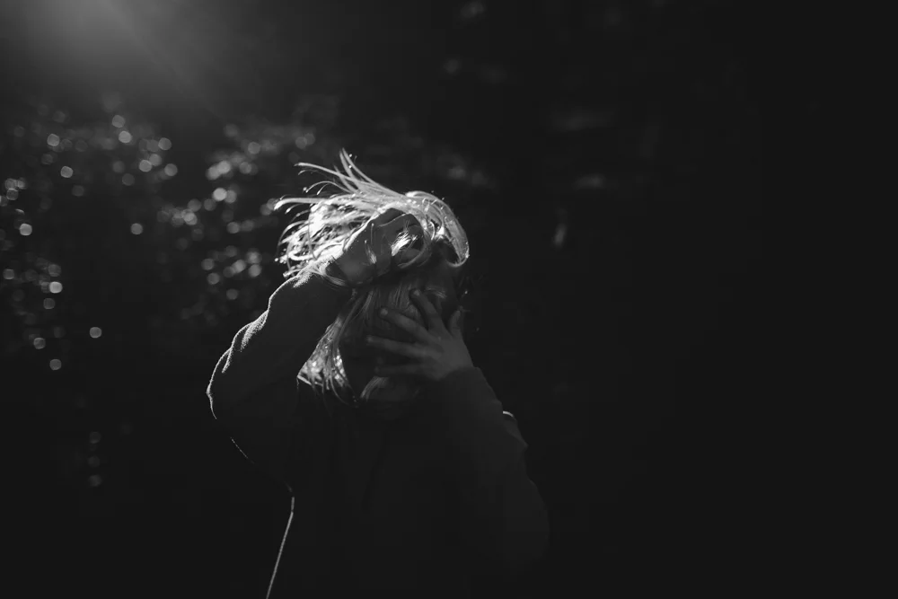 351/365 I was trying to get you to stand in some gorgeous light, and then I tried to fix your hair, and you did this. you really weren't in the mood to have your picture taken, especially with dzia-dziu there to play soccer with you. but i still love you and i love this image.