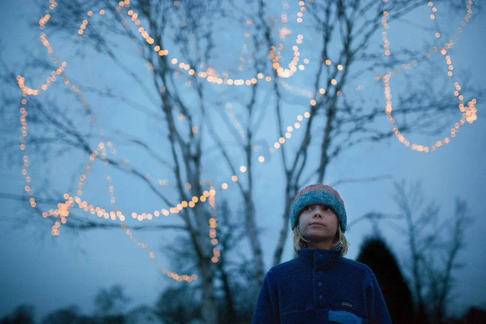 1.3.15 We were so busy today. Soccer first thing for Finn, breakfast at the Little Dog, errands. Then play dates and birthday parties. Thanks for going out into the very cold twilight for this image with our oh so lovely lights. f 1.4 | ISO 6400 | 35mm | 1/200