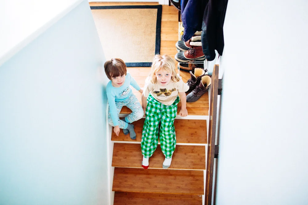 1.7.17 You two have been just bonkers lately, must be cabin fever. It has been so cold this week, you haven't been able to go outside and play at recess. You were using our stairs as a slide before school. f 1.6 | ISO 2500 | 35mm | 1/40