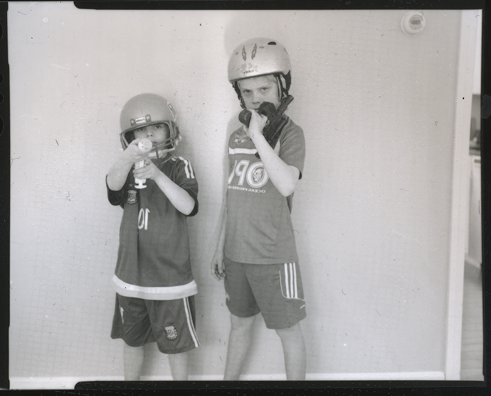 44/366 Armed | Graflex Crown Graphic | Delta 100 | D-76 | Contact Sheet Scan