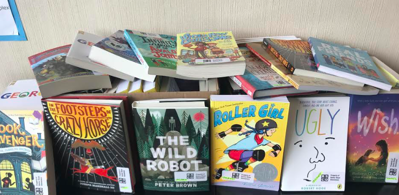 2018-19 OBOB books have arrived & are being labeled and sorted before landing in fourth grade classrooms.