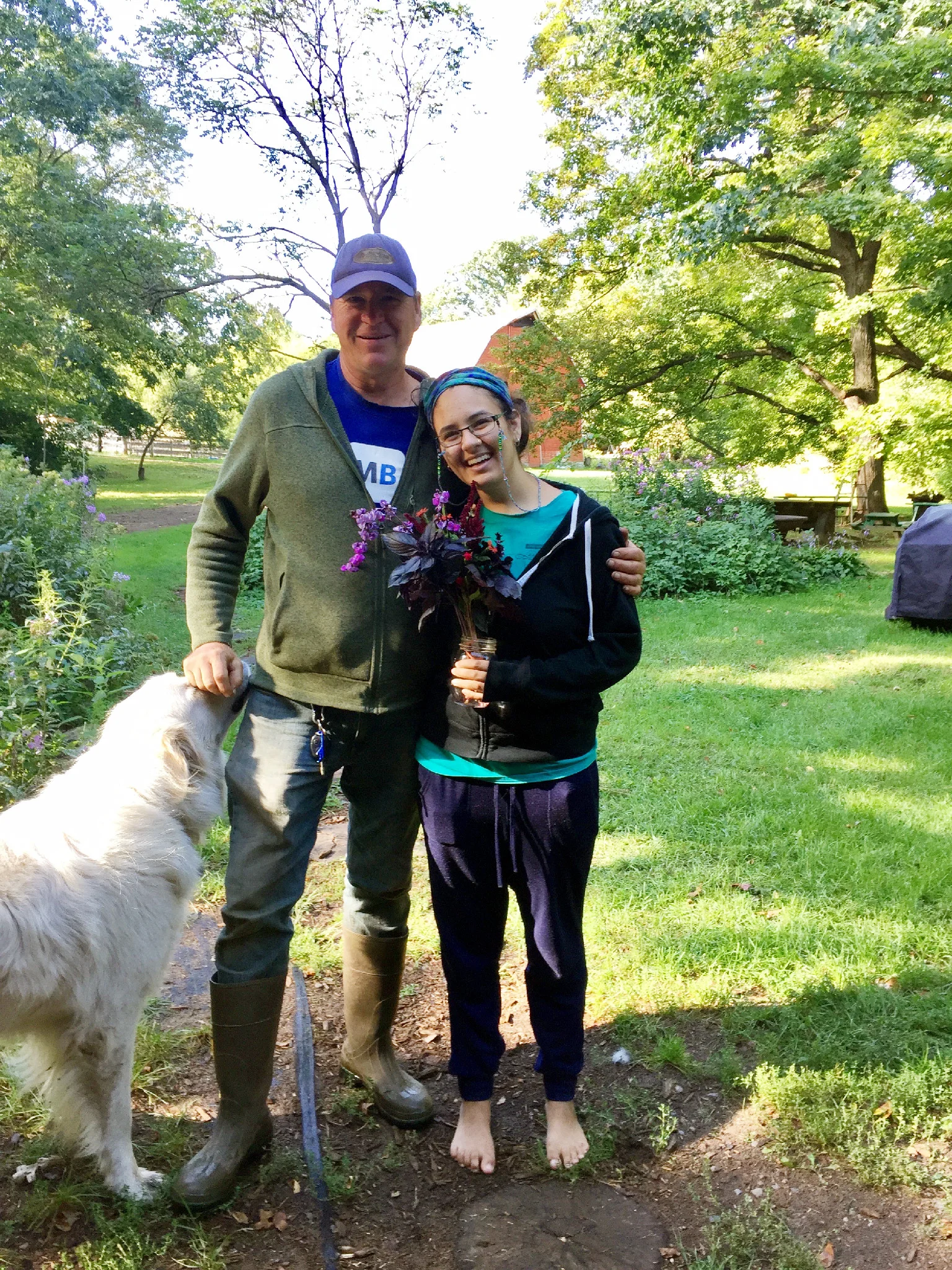 Almo the Great Pyrenees, Carter the Farmer, and Medha the CSA Manager. Sept 2017