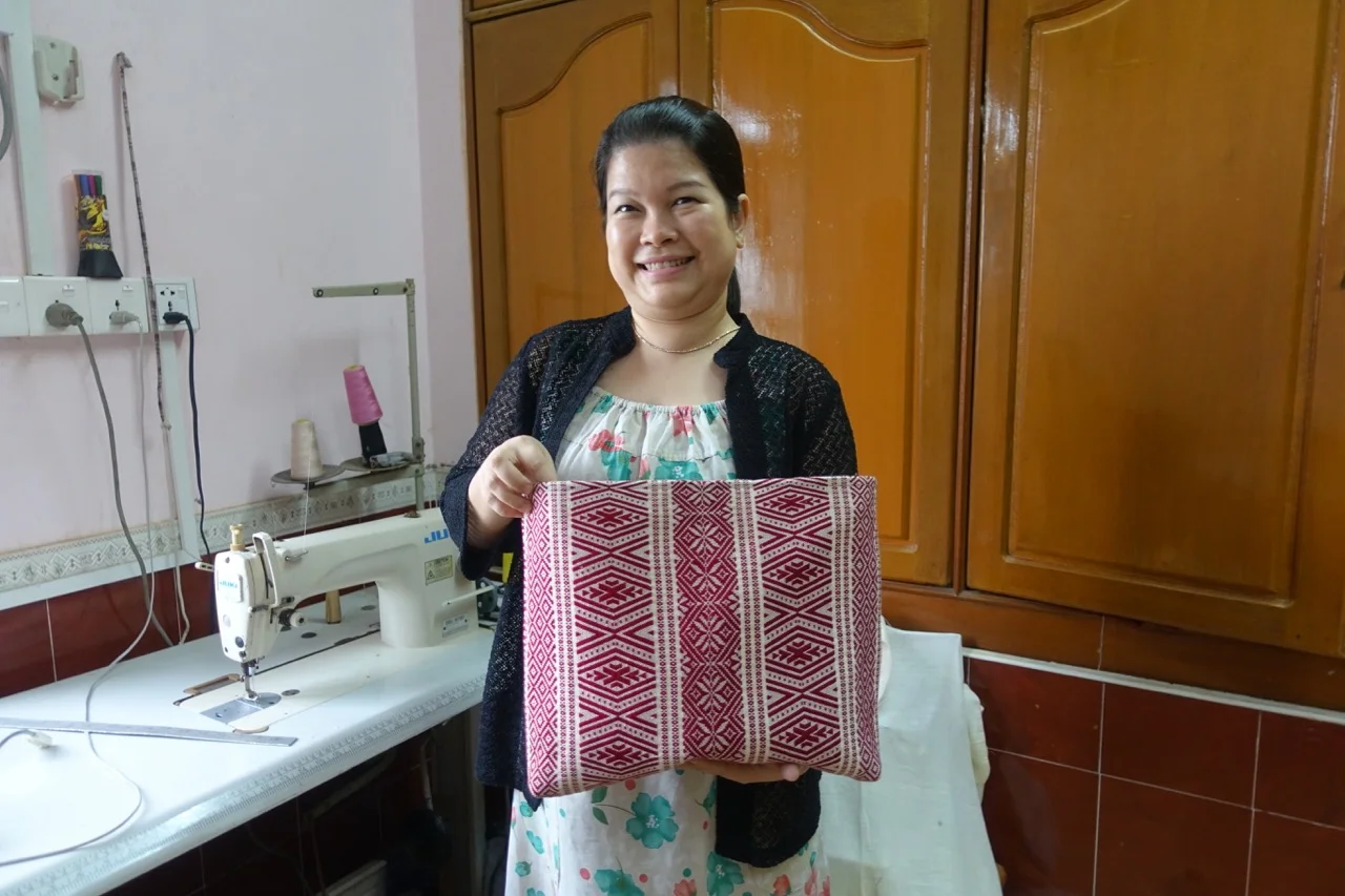 Thin Myat Soe , the amazing Thin Thin is a designer on the rise in the new Yangon fashion scene. Her roots go deep in the city and her memory is long but Thin Thin is a modern woman and always on the lookout for what’s new. She is a graduate of Yangon University, and a young mom, who lives atop her mother-in-law’s dress making shop in the hippest part of Yangon’s downtown. Thin Thin is a perfectionist so it’s no surprise that she has emerged as an in demand bag designer and we look forward to the launch of her own clothing line.