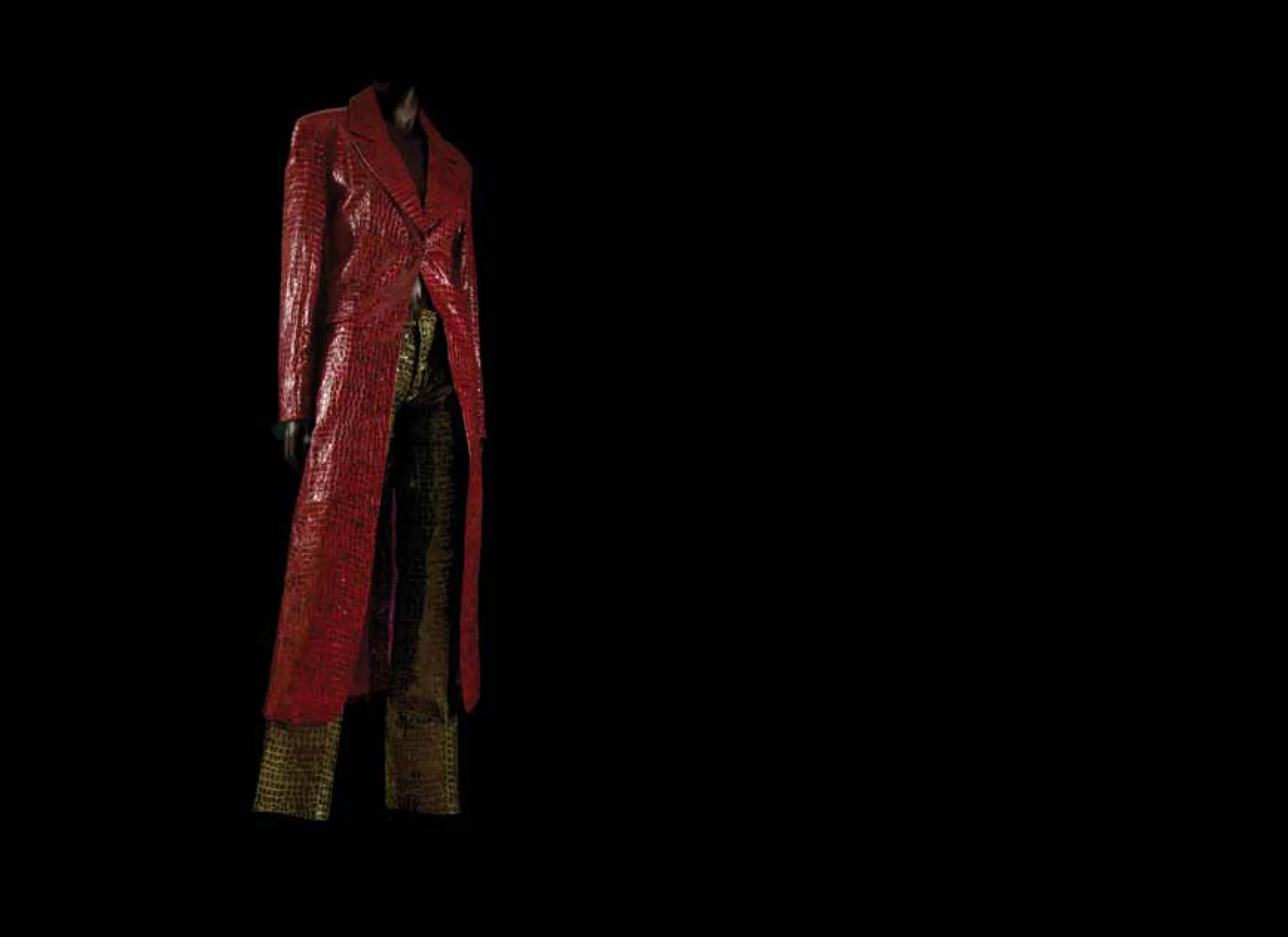 Image: Mel B, Meeting with Nelson Mandela, Johannesburg, 1997. Two-piece croc leather buttoned suit. Designed by William Hunt