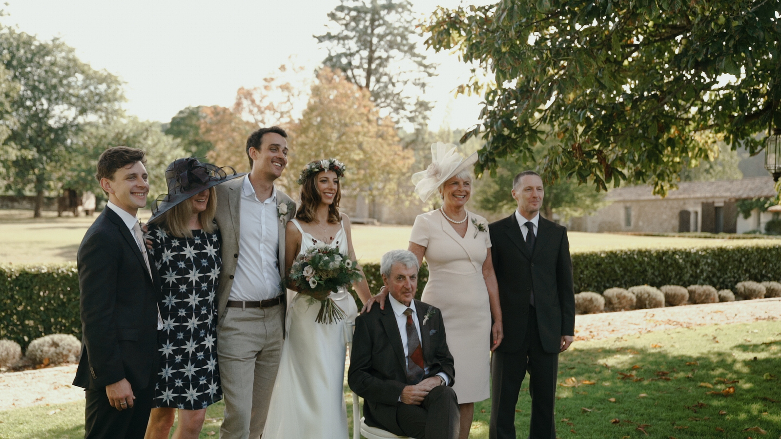 family photo in the gardens at Chateau Rigaud