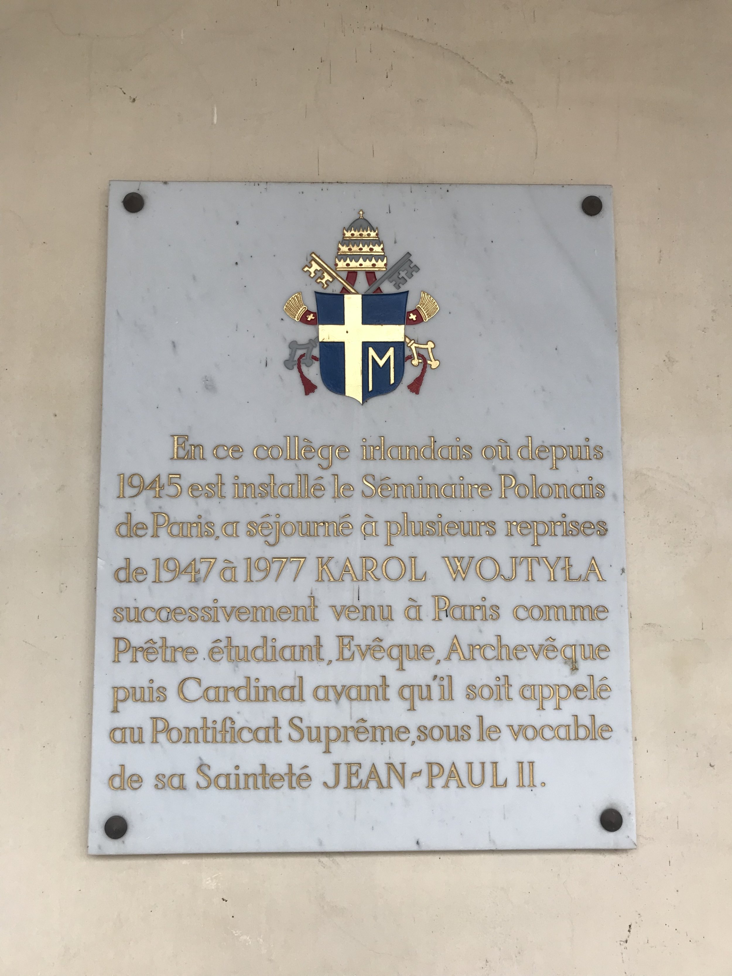 A commemorative plague in the college’s court about the Polish Seminary in Parias and visits of Karol Wojtyla
