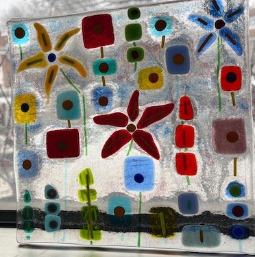 flowers on a snow day fused glass .jpg