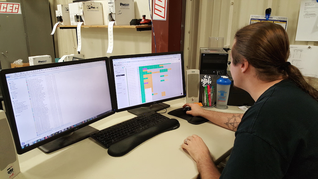 Garrod Massey at work scheduling his team. 