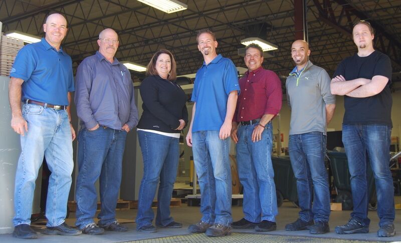 UCEC's Executive and Management teams. Paula is third from left. 