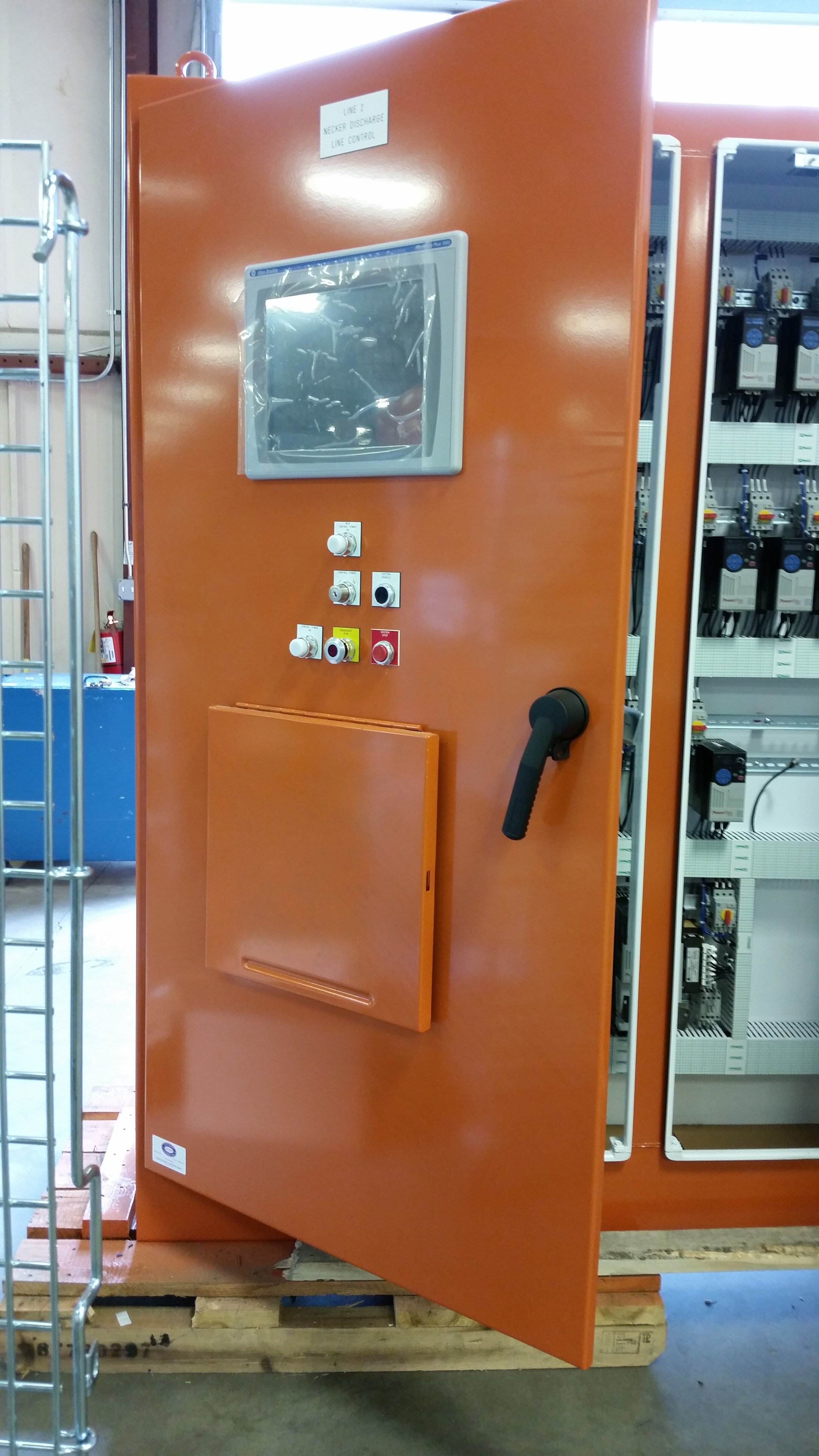 An HMI on the front of a control panel