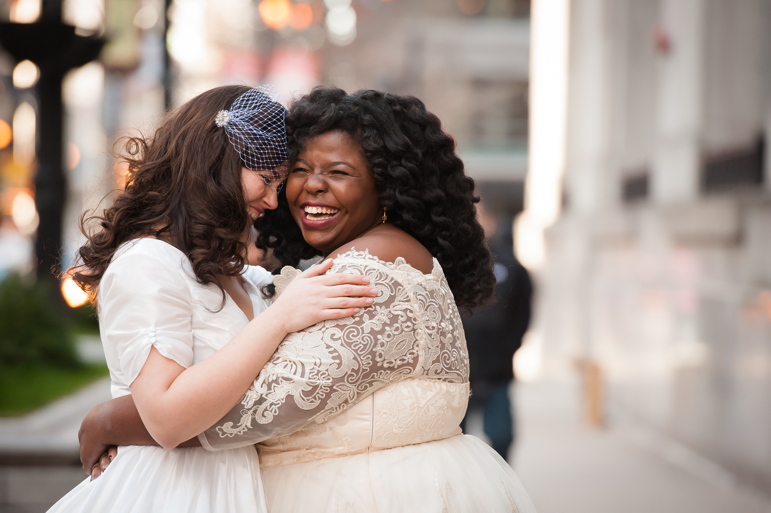 two brides in chicago hugging