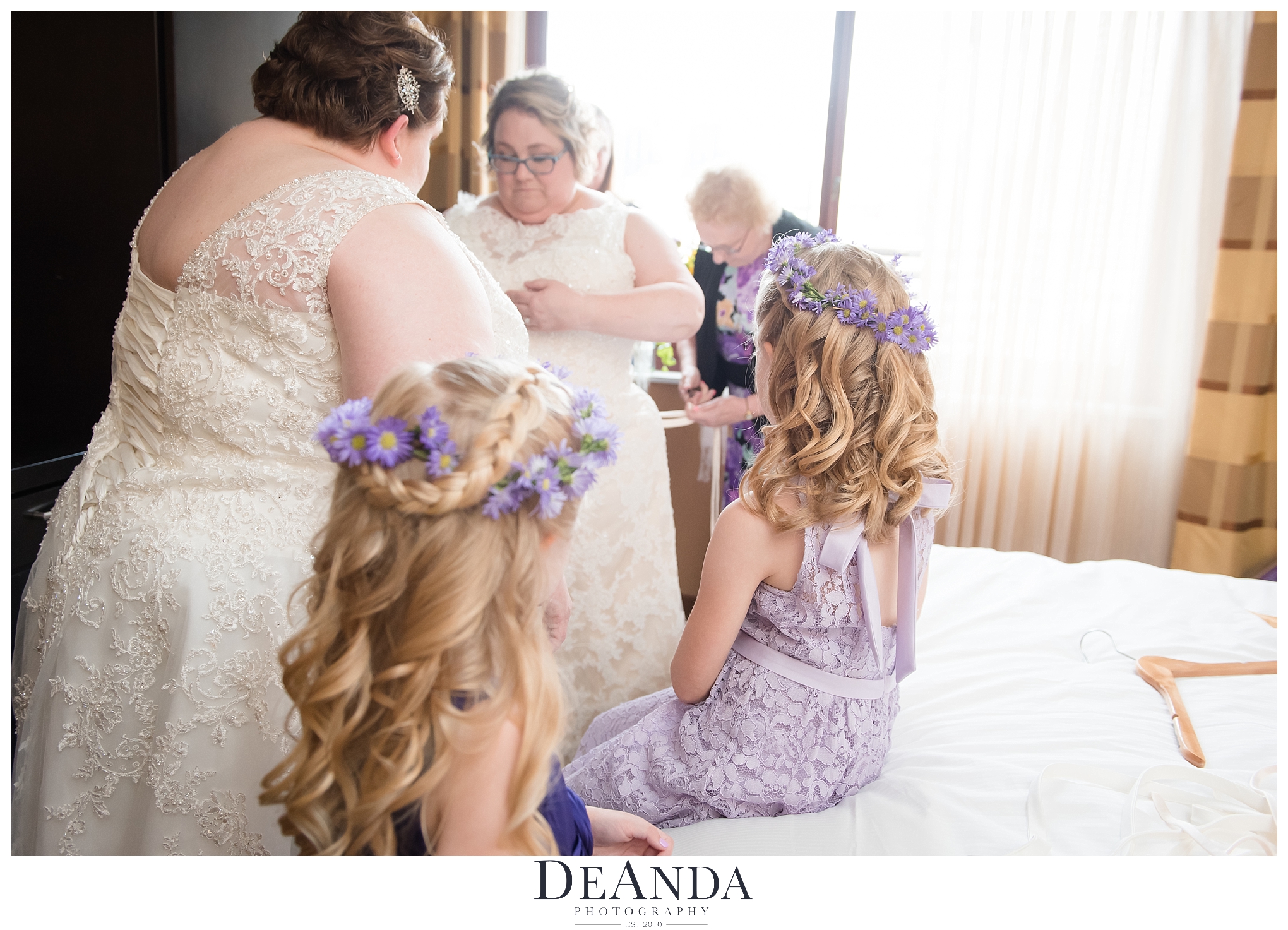 two brides getting ready for their wedding