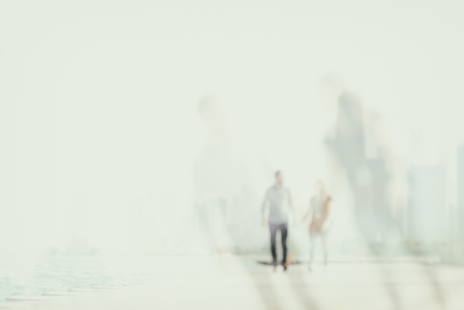 abstract couple in chicago walking along Lake Michigan