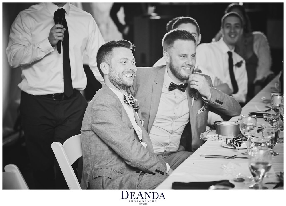 grooms laughing photojournallism