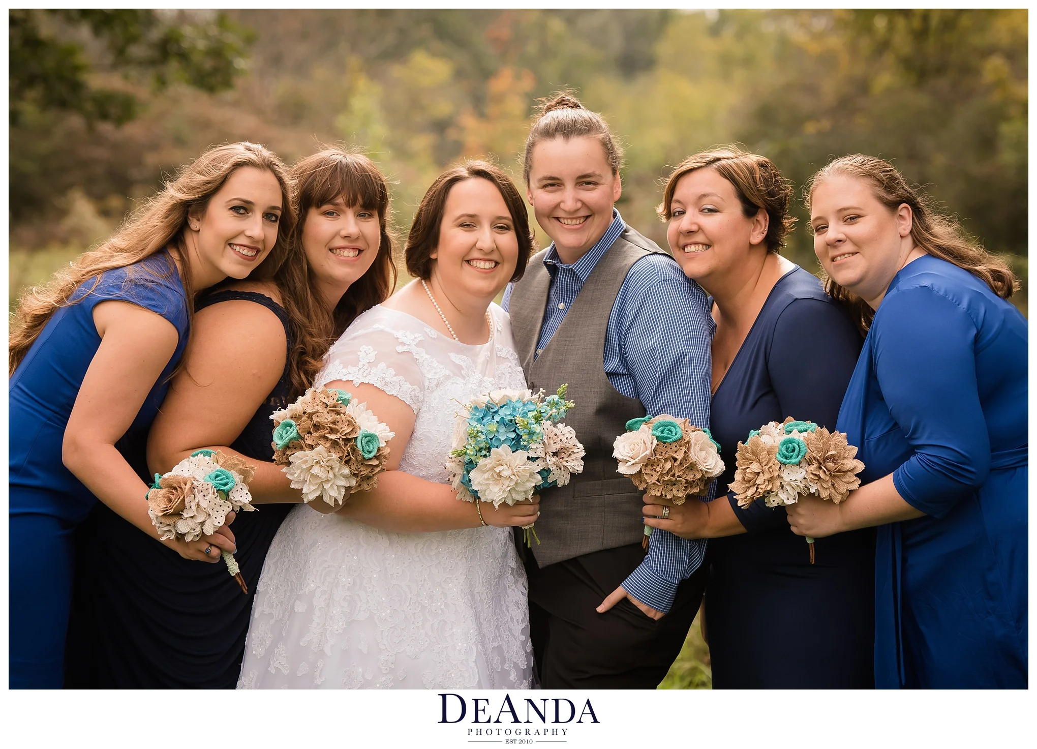 wedding party of same sex female couple