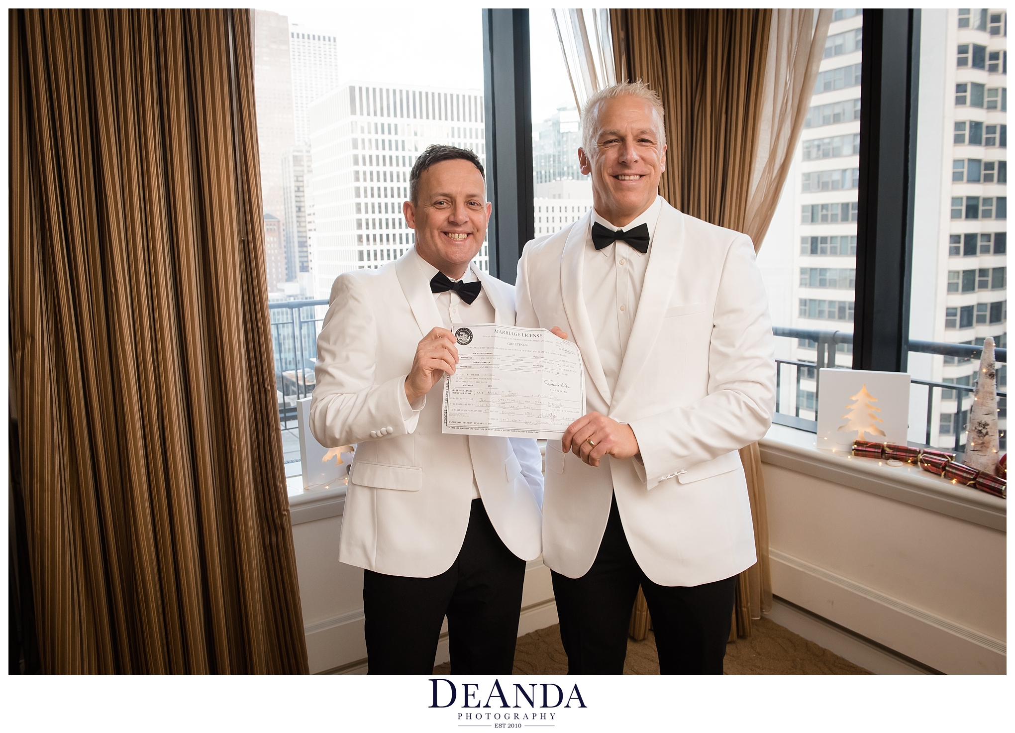 chicago grooms holding marriage certificate