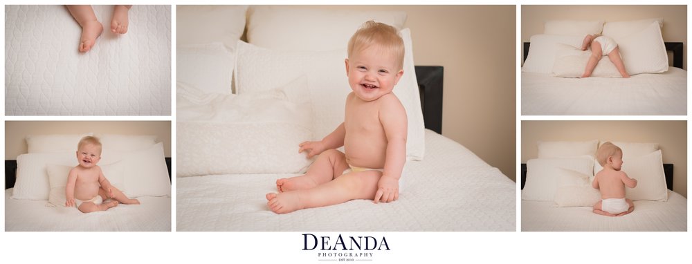 1 year old lifestyle portraits in home on bed in diaper