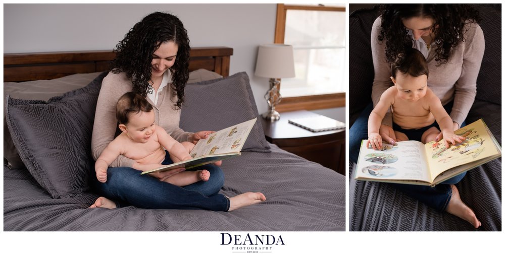 mom reading baby a book for photo shoot
