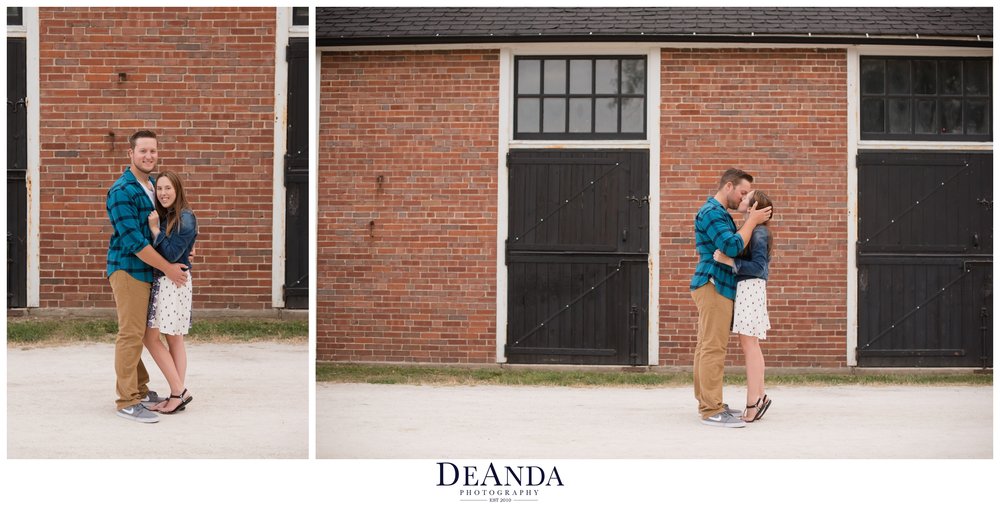 st.james farm engagement photos in front of stables