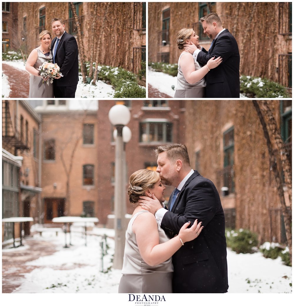 snowing portraits of bride and groom in ivy room courtyard 