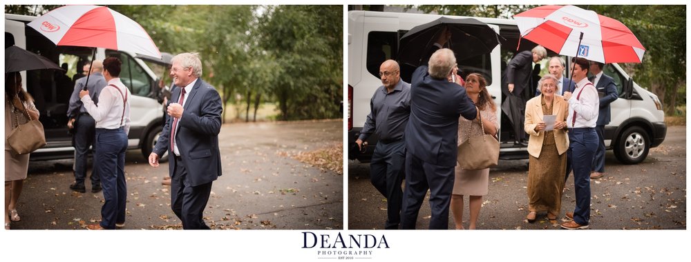 guests arriving under umbrellas to rainy October wedding in Chicago