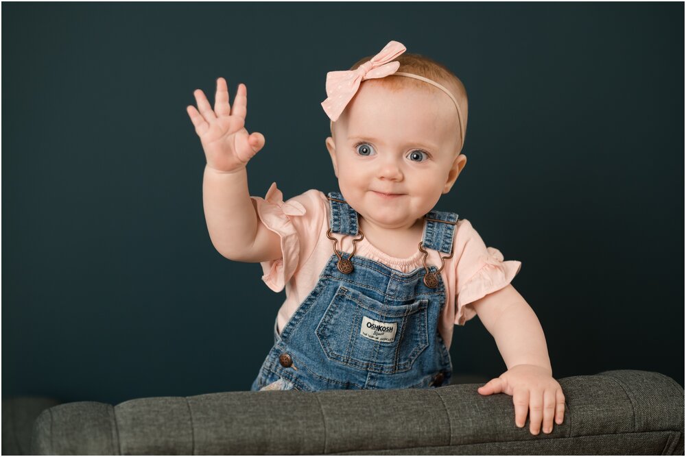 one year old waving