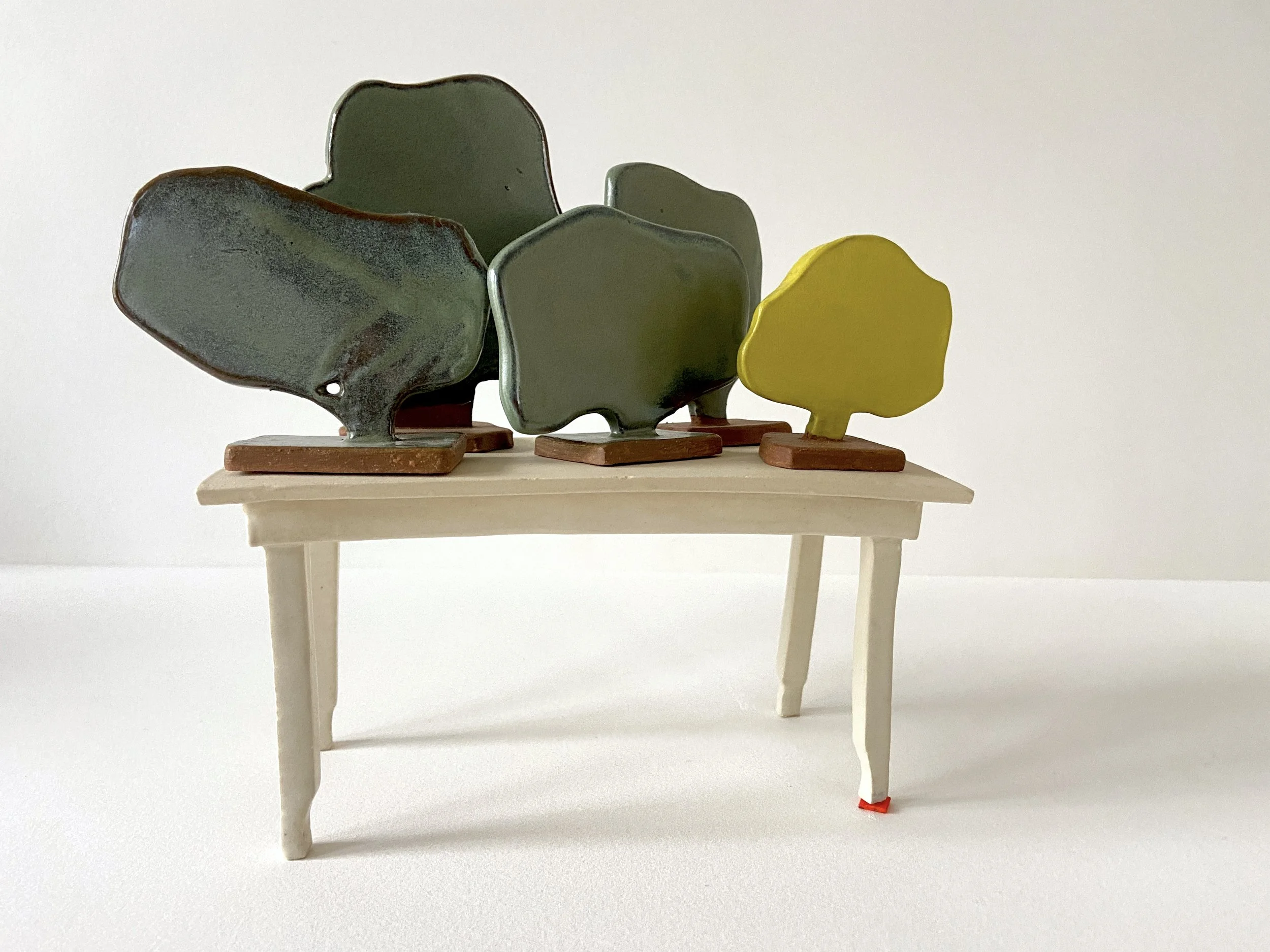  The Same (set of 5), 2022, glazed cone 6 ceramic stoneware, 4x7.25x3.5” set Shimmed Table, 2021, glazed cone 6 ceramic stoneware, 3.5x7.25x3.5” 