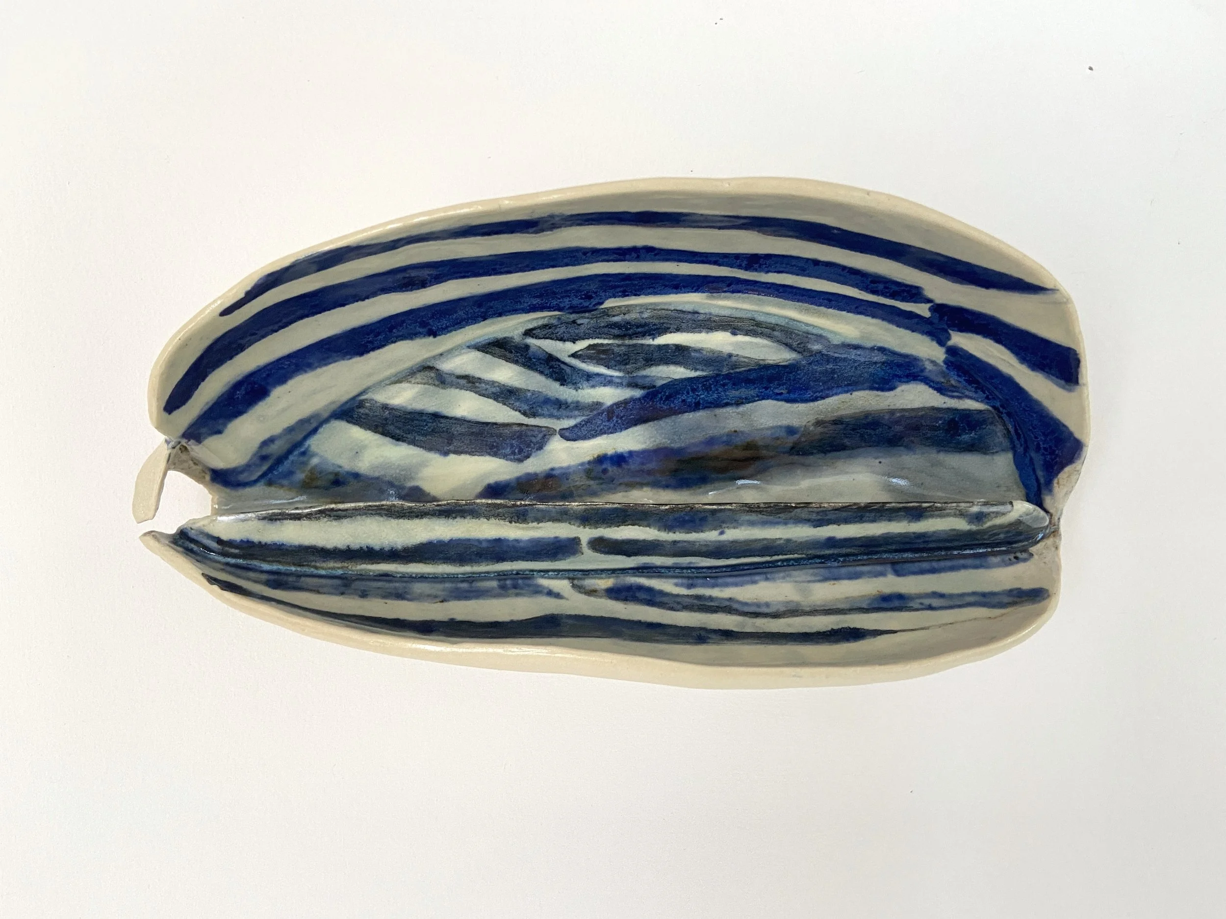  Enough, 2022, glazed cone 6 ceramic stoneware, 4x8x3.25” 