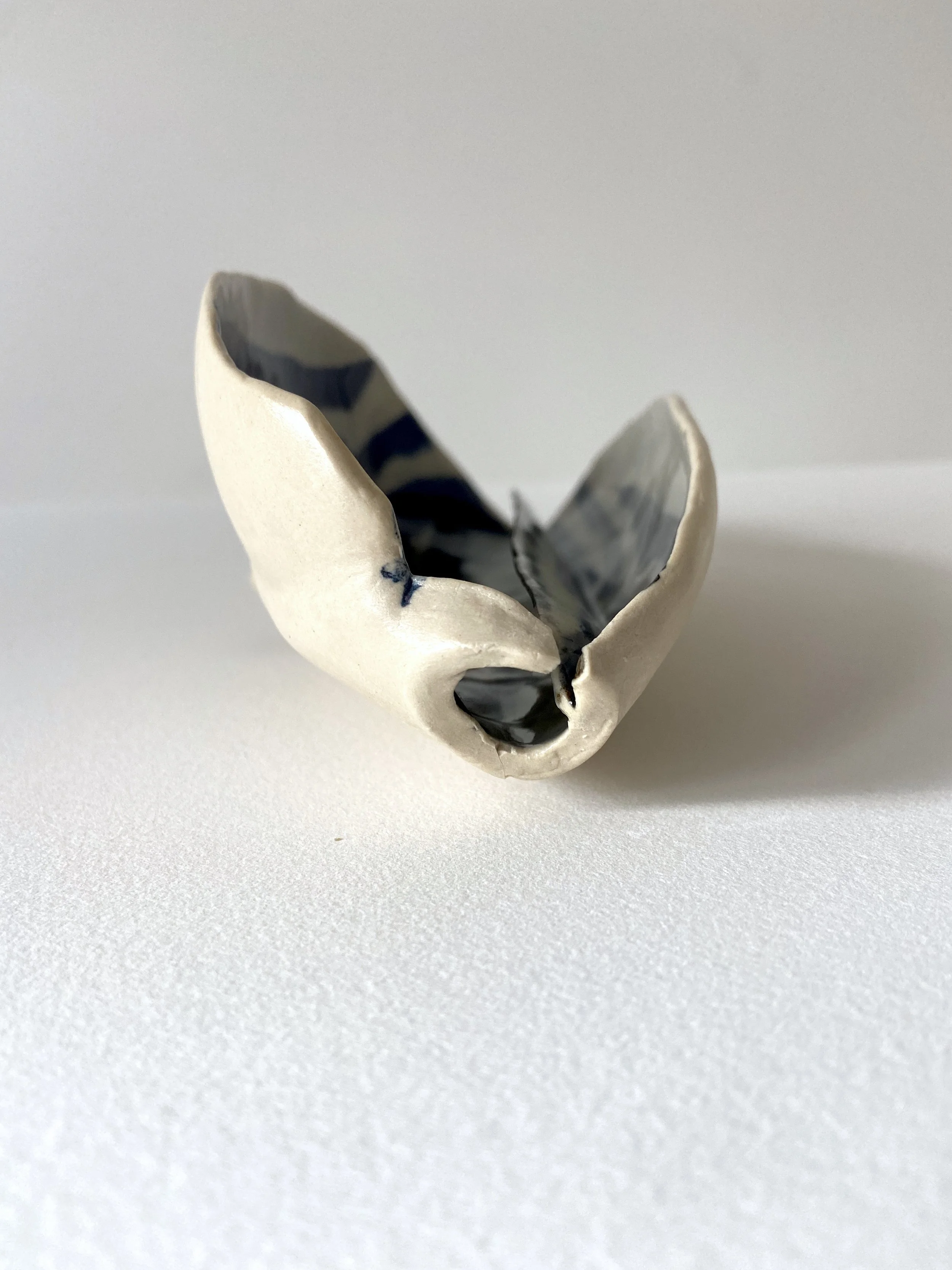  Enough, 2022, glazed cone 6 ceramic stoneware, 4x8x3.25” 