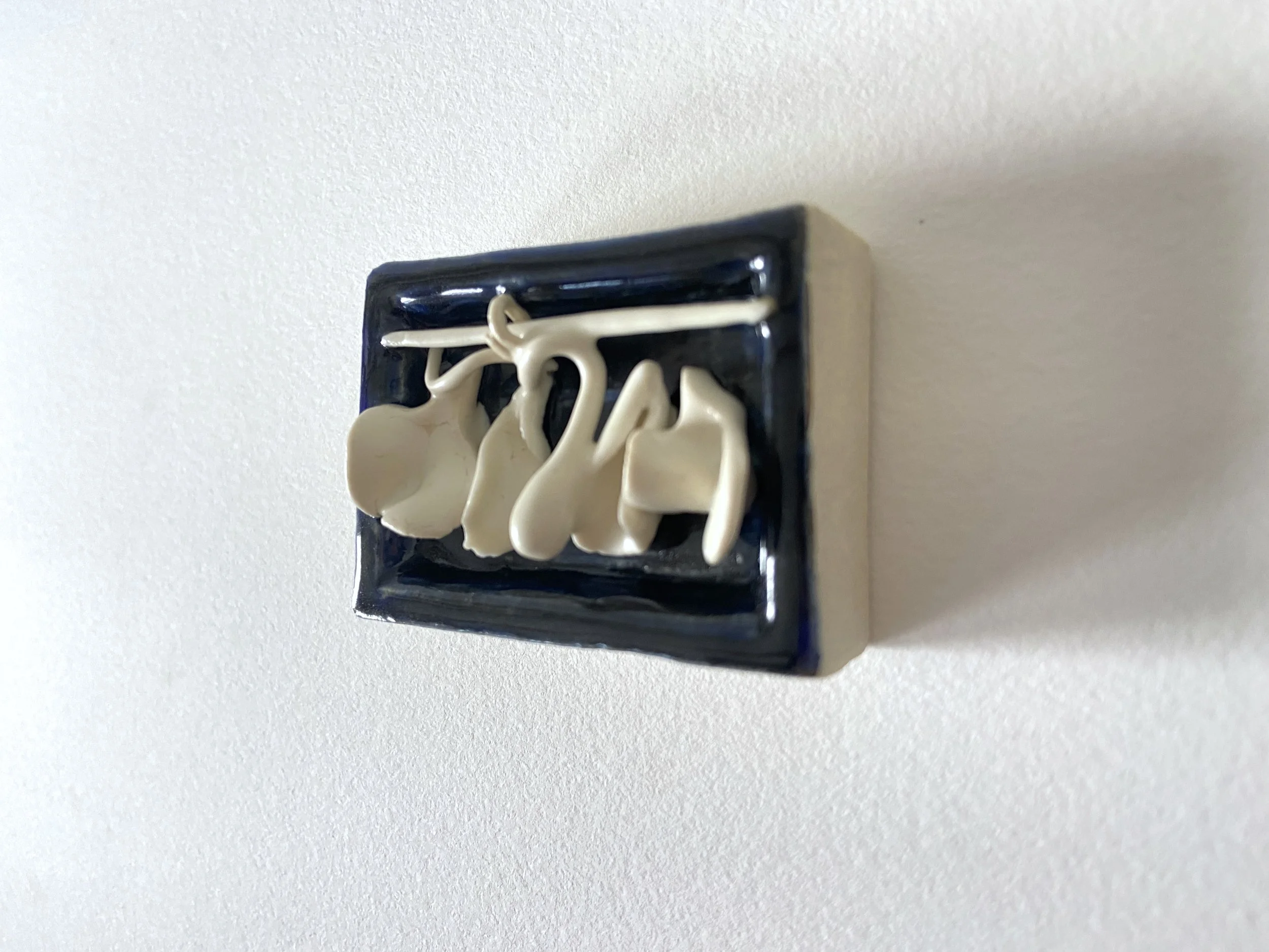  Garden, 2022, glazed cone 6 ceramic stoneware and porcelain, 1.75x3.25x0.5” 