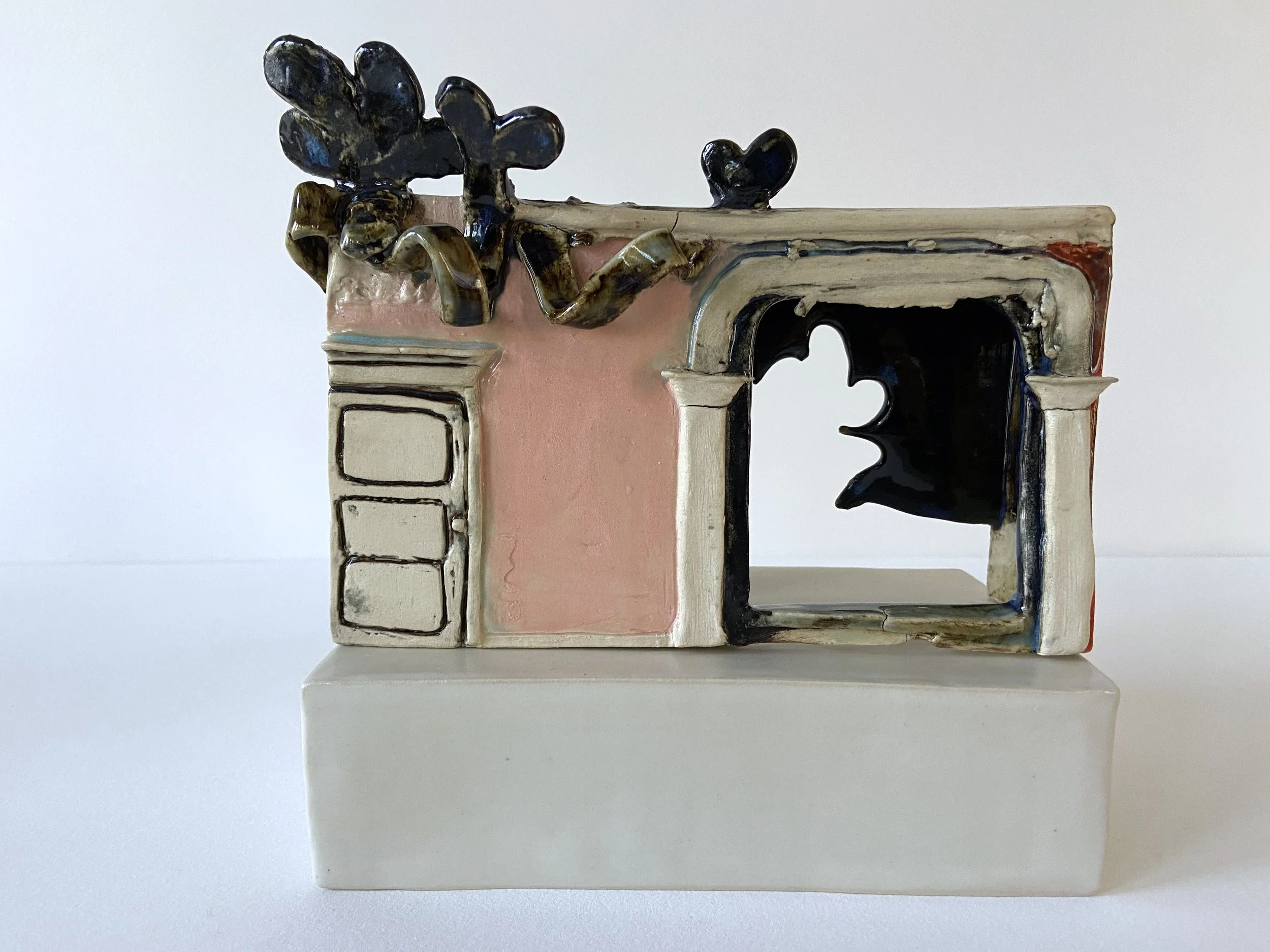  Jewelbox, 2022, glazed cone 6 ceramic stoneware, 5x6.5x1.5” (pictured on a plinth) 