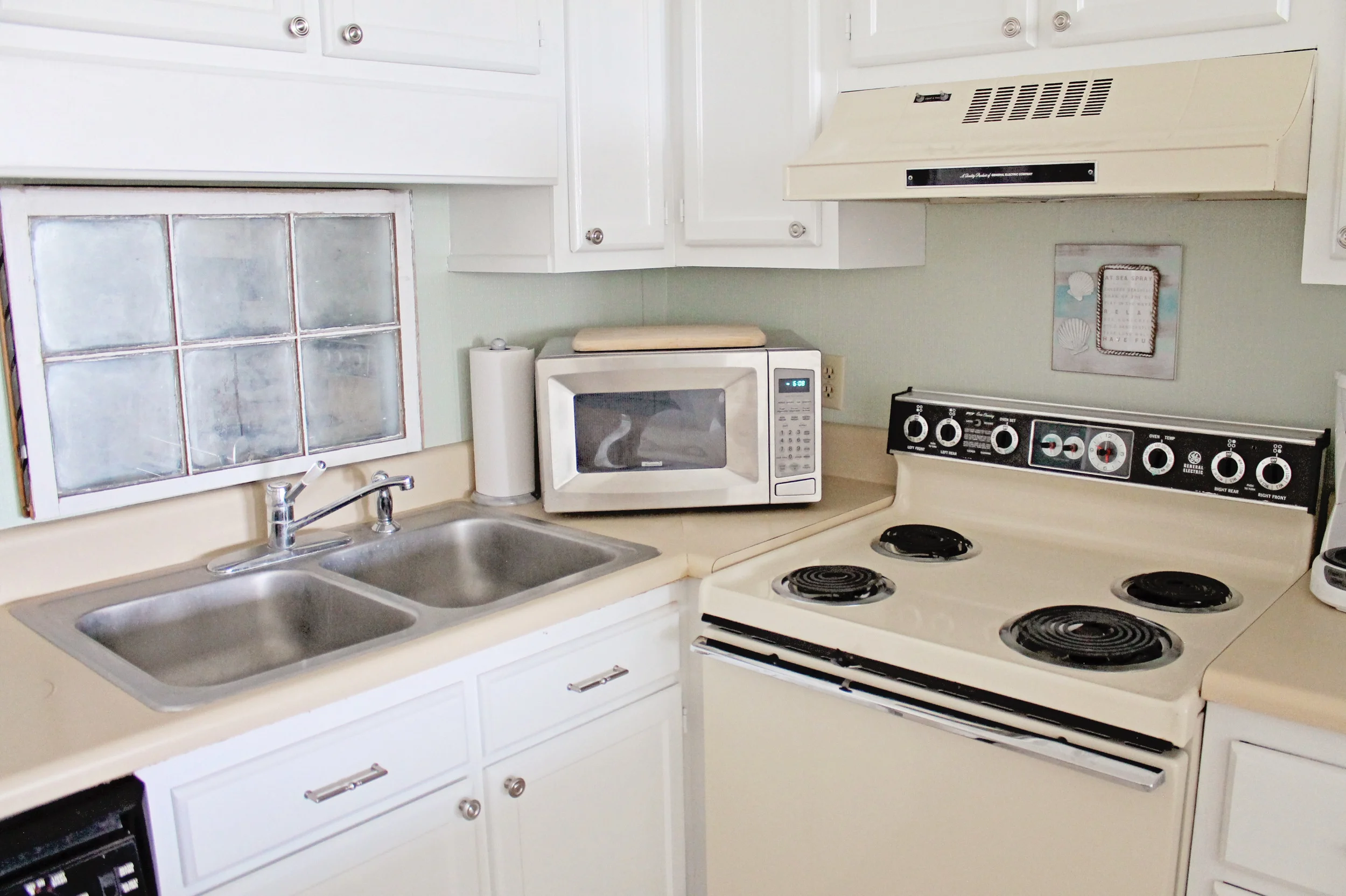 Elizabeth Burns Design | Beach Condo Before and After - beach decor ideas using sea foam green and aqua blue