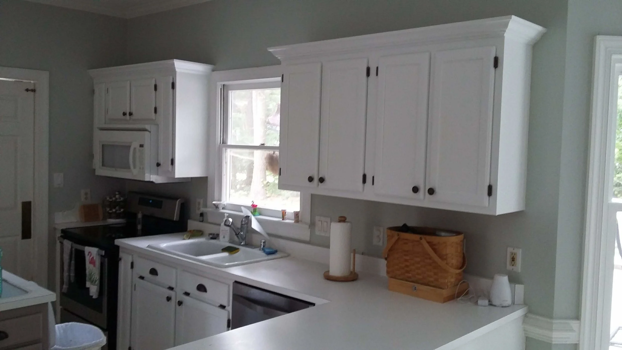 Elizabeth Burns Design | Raleigh Interior Designer - builder grade oak cabinets budget kitchen renovation, painting oak cabinets after