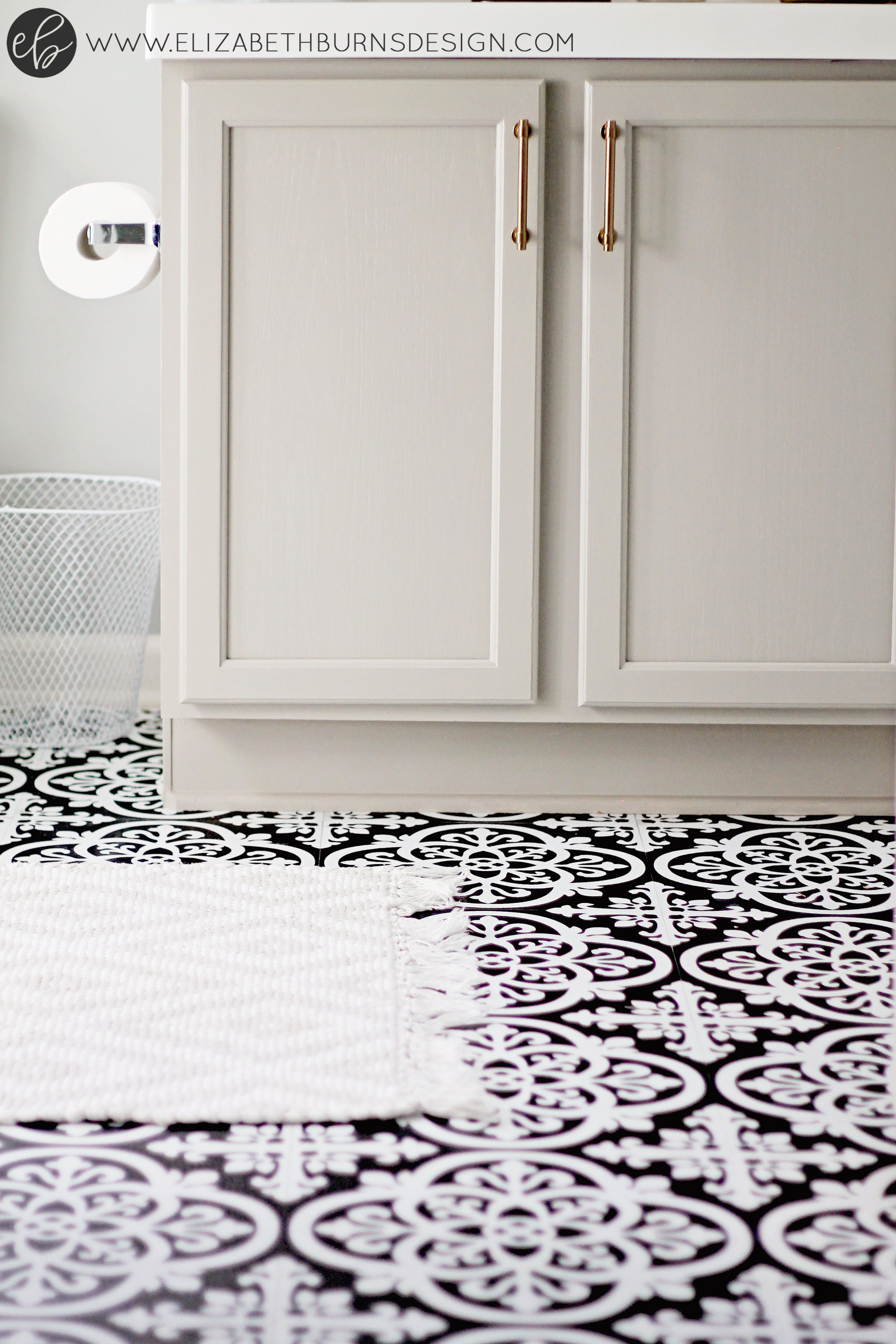 Easy DIY Peel and Stick Tiles on a Bathroom Wall 