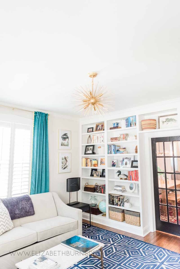 Elizabeth Burns Raleigh Interior Designer Modern Living Room Sputnik Chandelier Built-in Shelves Old House Pine Floors (40).jpg