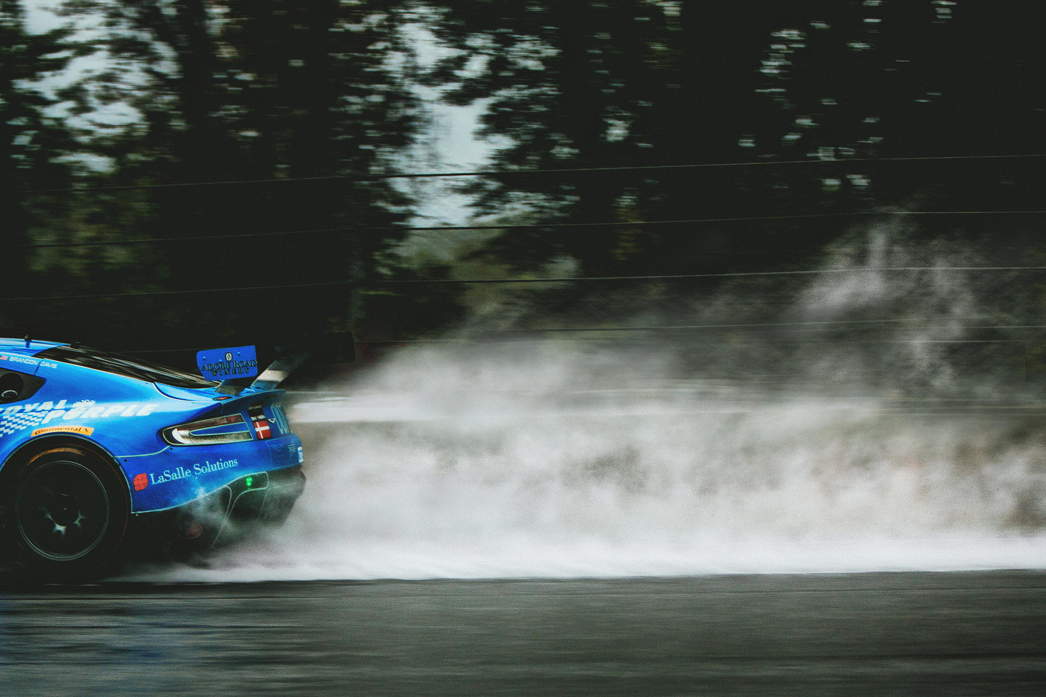 Ever since I first started taking photos, I've always been interested in cars. The sounds, the smells, the feels...All of the feels. These cars at Petit Lemans are on a completely different level than I have ever seen. A Porsche GT3 going past you at 150+ miles per hour while shifting with a holinger shifter is something I wouldn't mind listening to every day for the rest of my life. It's so perfect. The little exhaust pops instantly make you smile. I was invited by YAER to come along and shoot at Road Atlanta and I'm sure glad I said yes because this weekend was definitely a unique experience. Why? Well...You probably heard of the recent hurricane to batter the east coast of the US...Hurricane Joaquim? Yeah, Joaquim hit Road Atlanta pretty hard. It was raining all three days and the actual race day got cut short because of the overflowing rain on the track. But - with crazy weather conditions comes crazy imagery. I have never shot any cars of this caliber and definitely haven't shot cars that are going as fast as they were going. Most of the photos I took were on a 70-200L with a 2x extender or without the extender. No wide pans which makes me sad but this was a different approach for me. I didn't know the track or the angles and had to make due with what knowledge I had. For the weather conditions and my knowledge of the track/this genre of photography...I would like to think I got some pretty unique shots. Until next year! 