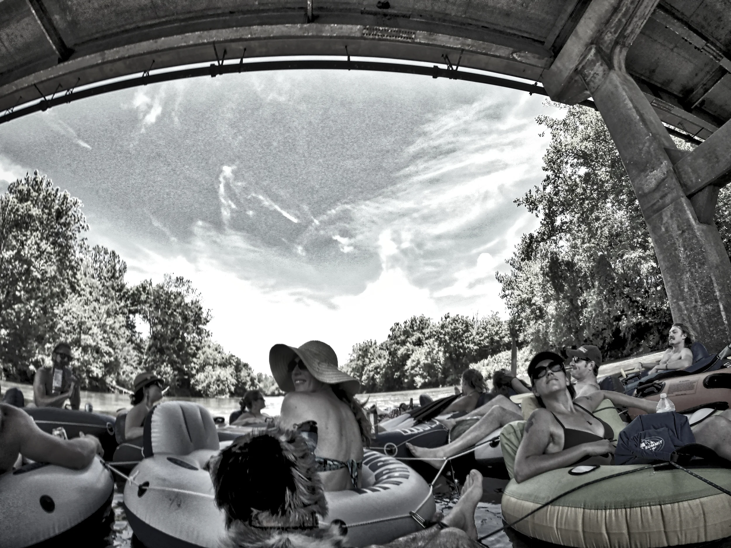 Tubing under the bridge.