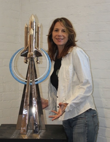 Terrie Bennett with the piece she designed for NASA